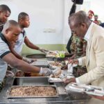 Le Président Patrice Talon visite la caserne de Dessa, rendant hommage aux soldats béninois et célébrant les avancées majeures en faveur des forces armées.